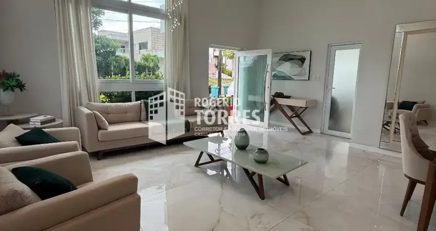 Casa Térrea a venda de 6 suítes, piscina e área gourmet com churrasqueira e 4 garagens em Alphaville Litoral Norte 2