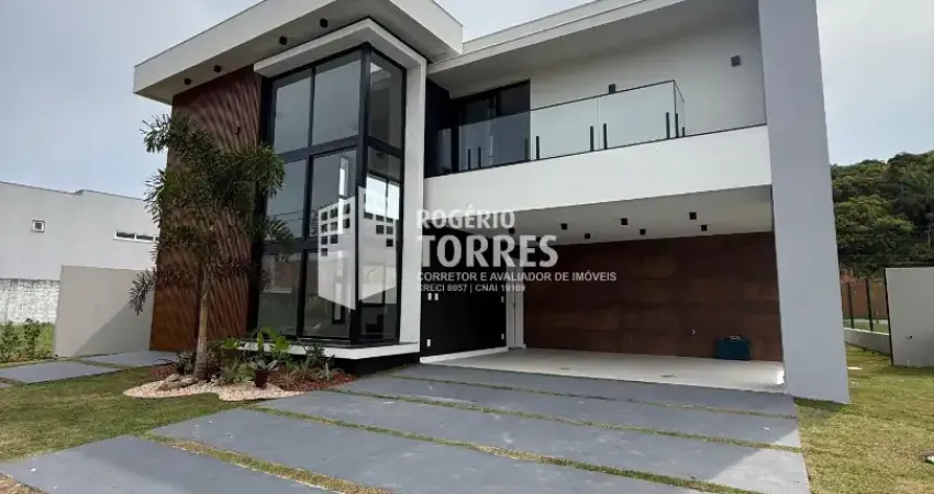 Casa duplex a venda de 4 suítes + dependência e área gourmet + piscina e 4 garagens em alphaville litoral norte 3