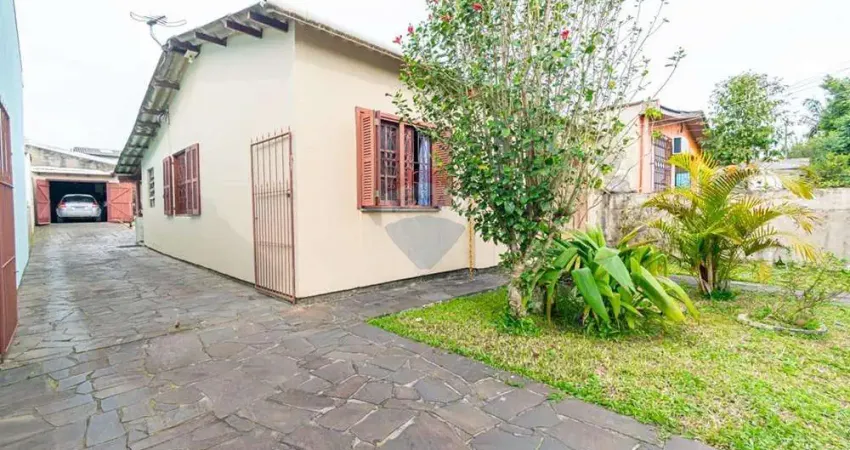 Casa com 3 quartos à venda na Avenida Girassol, 217, Parque dos Anjos, Gravataí