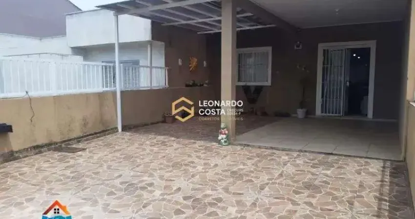 Bela casa geminada em bairro nobre próxima da praia