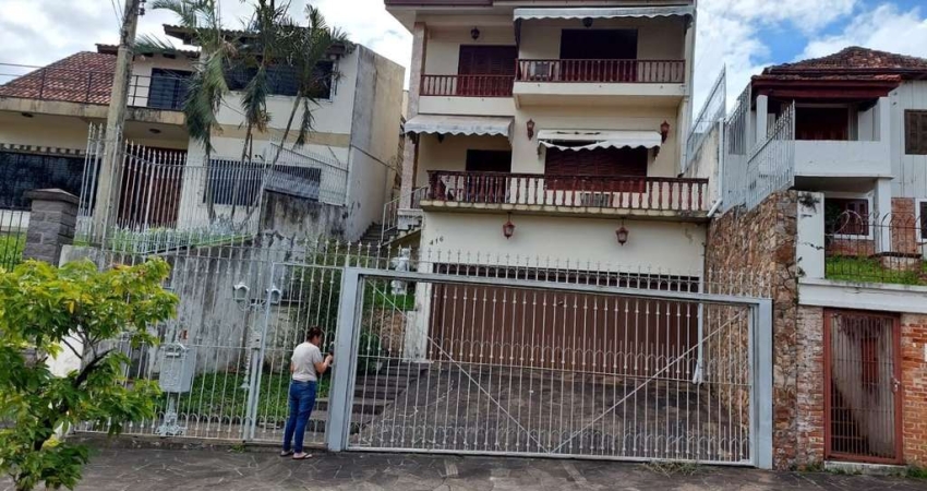 Casa com 6 quartos à venda na Rua Tomaz Edison, 416, Santo Antônio, Porto Alegre