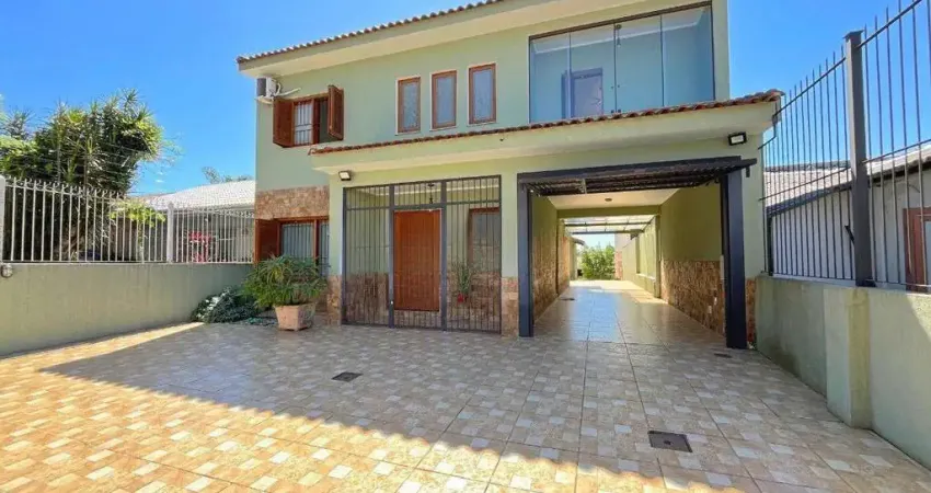 Casa com 6 dormitórios à venda, 344 m² por R$ 1.350.000,00 - Tristeza - Porto Al