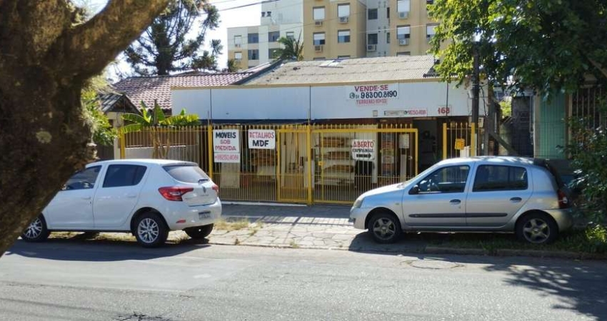 Terreno à venda, 327 m² por R$ 582.000,00 - Cavalhada - Porto Alegre/RS