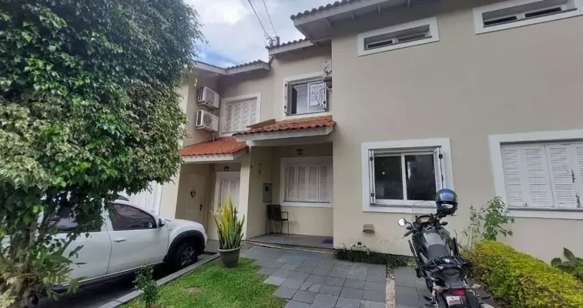 Casa com 3 dormitórios à venda, 144 m² por R$ 540.000,00 - Cavalhada - Porto Ale