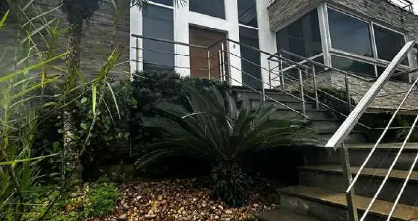 Casa com 4 quartos à venda na Rua Tocantins, 540, Lomba do Pinheiro, Porto Alegre