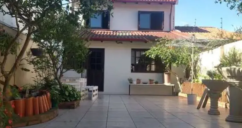 Casa com 4 dormitórios à venda, 245 m² por R$ 880.000,00 - Cavalhada - Porto Ale
