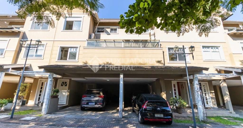 Casa em condomínio fechado com 4 quartos à venda na Rua Attílio Bilibio, 120, Jardim Carvalho, Porto Alegre