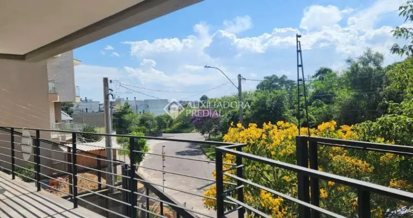 Casa com 3 quartos à venda na Rua Doutor Sérgio de Figueiredo, 300, Guarujá, Porto Alegre