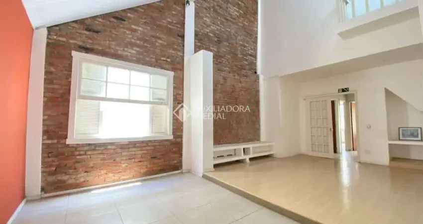 Casa com 3 quartos à venda na Rua Miguel Tostes, 849, Rio Branco, Porto Alegre