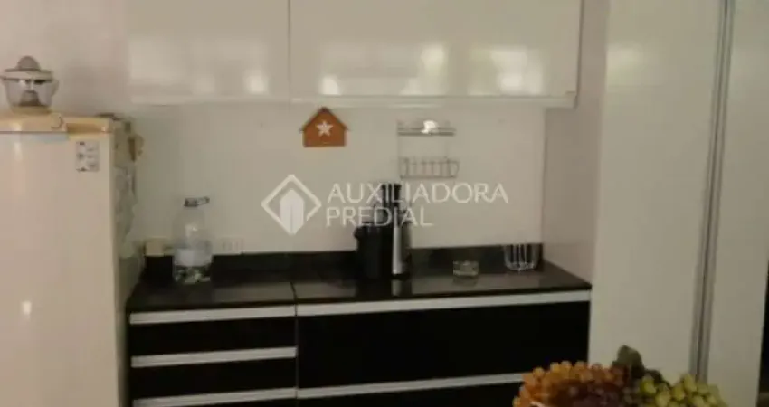 Casa em condomínio fechado com 3 quartos à venda na Rua Erechim, 293, Nonoai, Porto Alegre