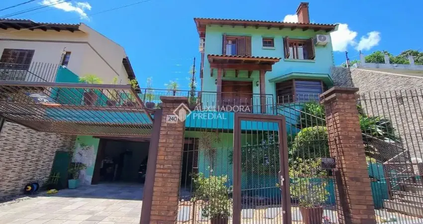 Casa com 3 quartos à venda na Rua Doutor Francisco de Sá Brito, 240, Partenon, Porto Alegre