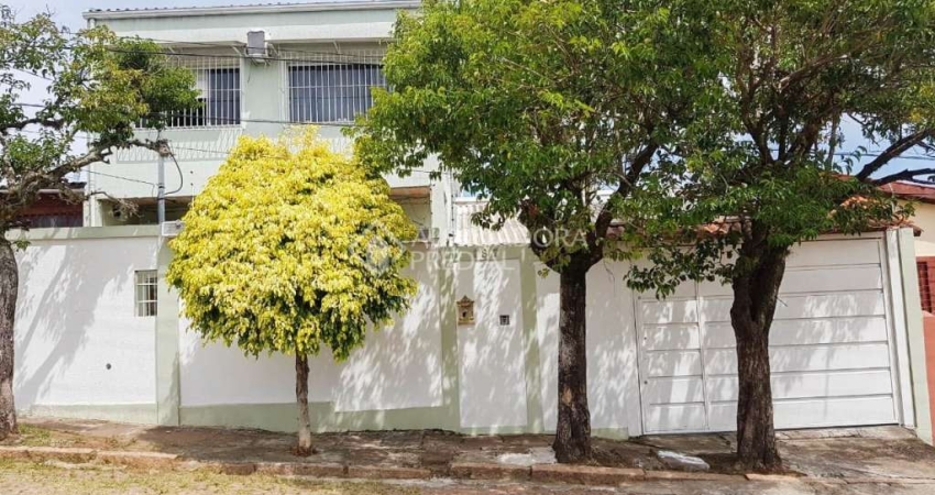 Casa em condomínio fechado com 4 quartos à venda na Rua Querubim Costa, 187, Coronel Aparício Borges, Porto Alegre