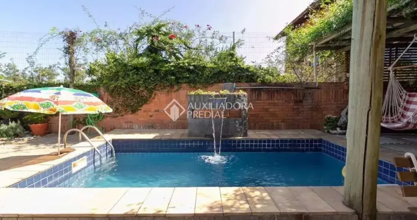 Casa com 4 quartos à venda na Rua Doutor Paulino Guerra, 575, Jardim Itu Sabará, Porto Alegre