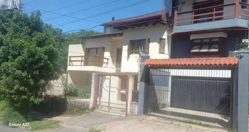 Casa com 3 quartos à venda na Avenida Doutor Petrônio Portella, 1140, Parque Santa Fé, Porto Alegre