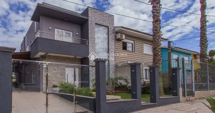 Casa em condomínio fechado com 3 quartos à venda na Rua Chácara das Nascentes, 245, Lomba do Pinheiro, Porto Alegre