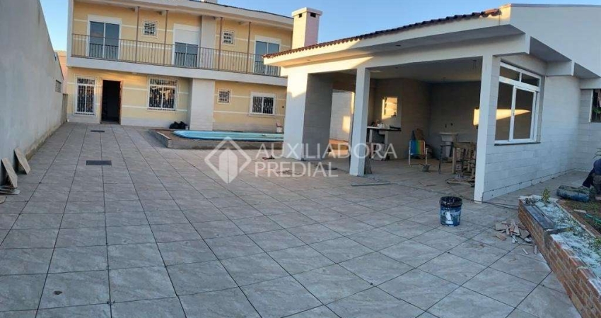 Casa em condomínio fechado com 4 quartos à venda na Rua Província de São Pedro, 100, Jardim dos Lagos, Guaíba