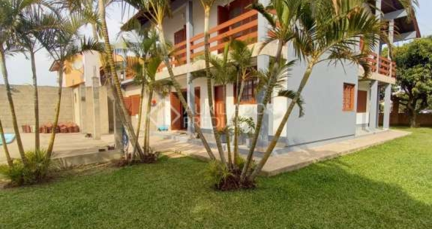 Casa em condomínio fechado com 4 quartos à venda na Avenida Maurício Lessa, 535, Flórida, Guaíba