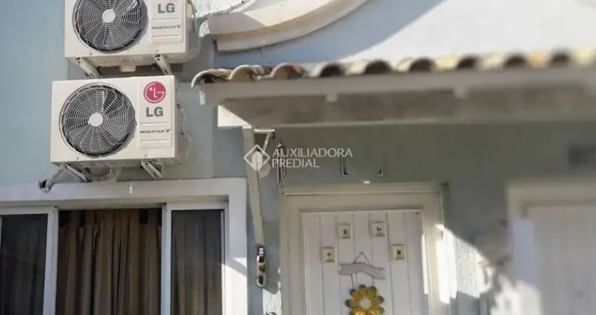 Casa em condomínio fechado com 2 quartos à venda na Avenida Guilherme Schell, 1250, Rio Branco, Canoas