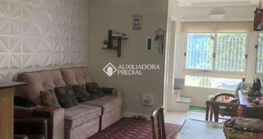 Casa em condomínio fechado com 3 quartos à venda na Rua Dante Poggetti, 326, Jardim Itu Sabará, Porto Alegre