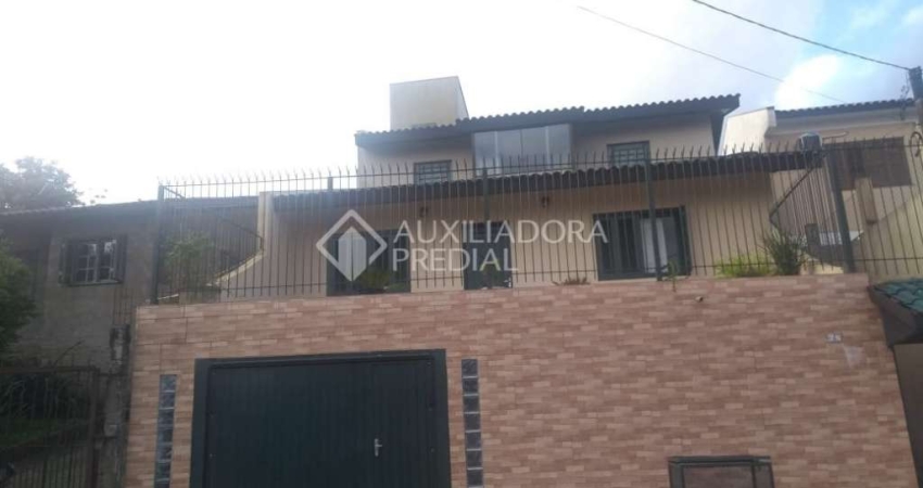 Casa em condomínio fechado com 3 quartos à venda na Rua Nova Araça, 67, Vila Augusta, Viamão