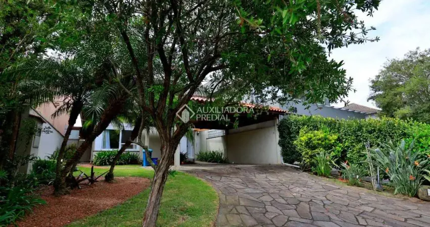 Casa em condomínio fechado com 3 quartos à venda na Avenida Juca Batista, 8000, Belém Novo, Porto Alegre
