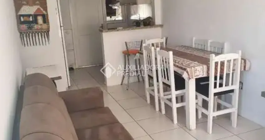 Casa em condomínio fechado com 2 quartos à venda na Estrada Costa Gama, 5124, Restinga, Porto Alegre