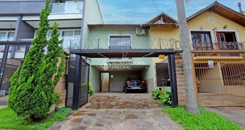 Casa com 3 quartos à venda na Rua do Pampa, 100, Costa e Silva, Porto Alegre