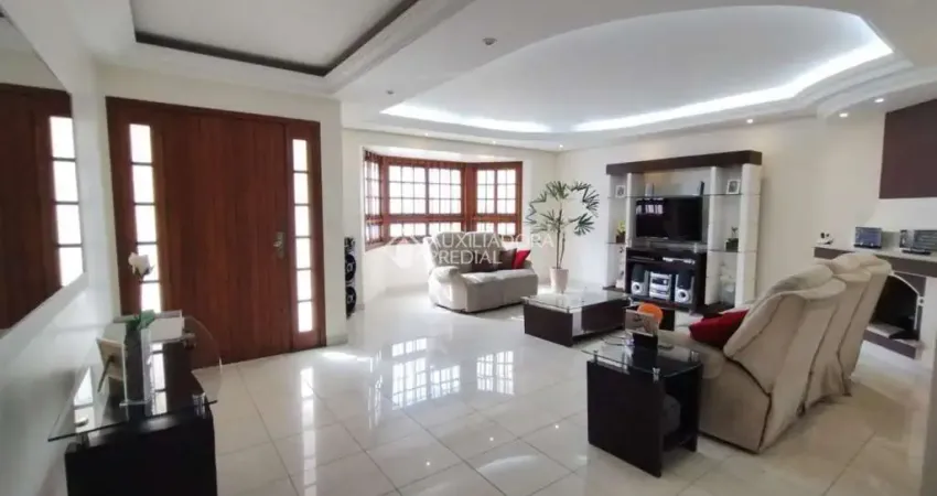 Casa com 4 quartos à venda na Rua Alfredo Silveira Dias, 15, Nonoai, Porto Alegre