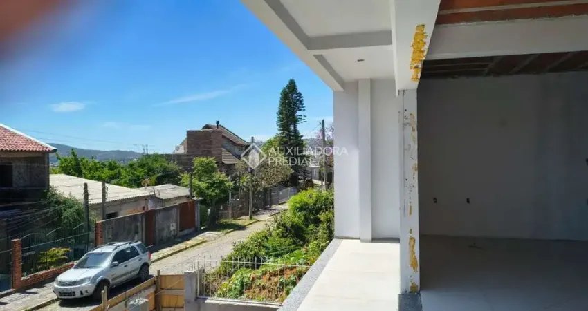 Casa em condomínio fechado com 3 quartos à venda na Marquês de Barbacena, 33, Partenon, Porto Alegre