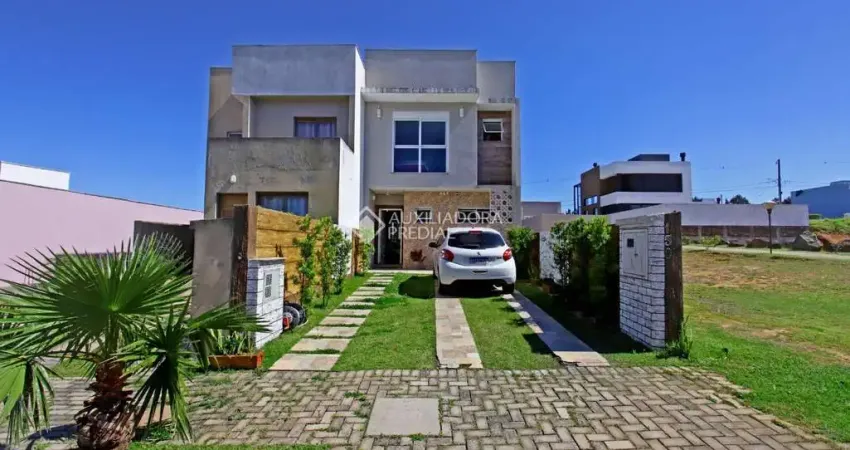 Casa em condomínio fechado com 3 quartos à venda na Rua Talita da Cunha Chaves, 620, Lomba do Pinheiro, Porto Alegre