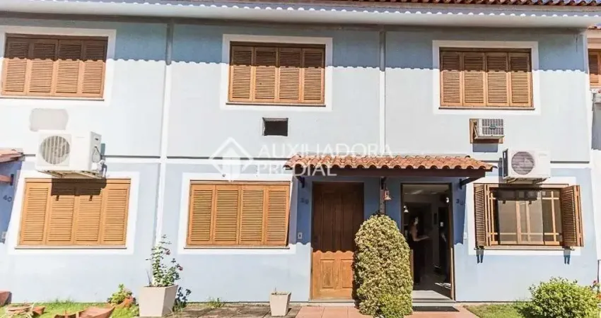 Casa em condomínio fechado com 3 quartos à venda na Rua Professora Thereza Noronha, 125, Espírito Santo, Porto Alegre