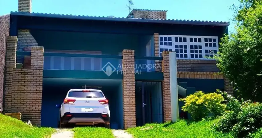 Casa em condomínio fechado com 4 quartos à venda na Rua dos Guananas, 290, Espírito Santo, Porto Alegre