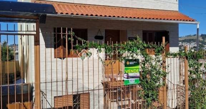 Apartamento com 2 quartos à venda na Rua Martim Minaberry, 405, Partenon, Porto Alegre
