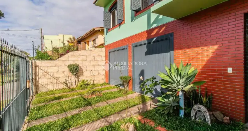 Casa com 3 quartos à venda na Avenida Sargento Manoel Raymundo Soares, 161, Jardim Carvalho, Porto Alegre