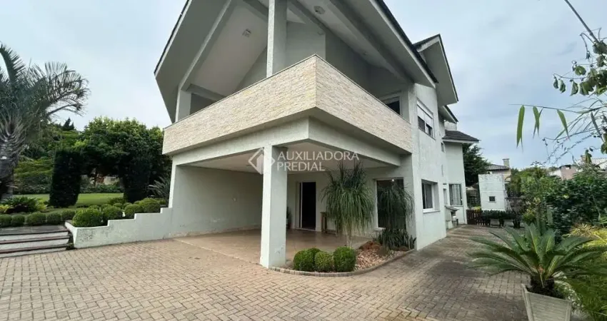 Casa em condomínio fechado com 3 quartos à venda na Estrada Capitão Gentil Machado de Godoy, 4500, Vila Elsa, Viamão