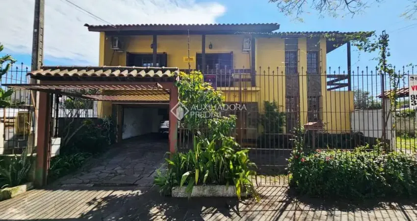 Casa com 4 quartos à venda na Rua Evangelina Porto, 425, Vila João Pessoa, Porto Alegre