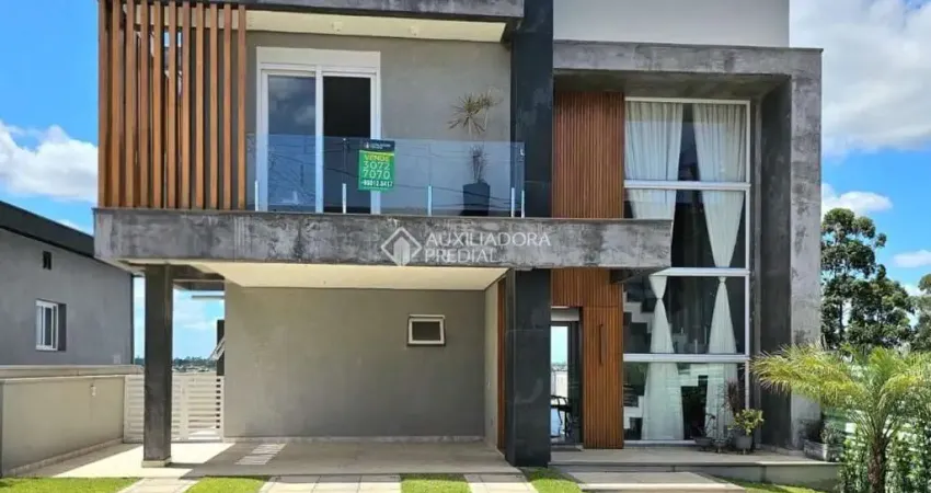 Casa em condomínio fechado com 3 quartos à venda na Rua Adolfo Inácio de Barcelos, 1490, Centro, Gravataí