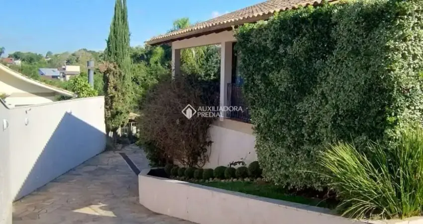 Casa em condomínio fechado com 4 quartos à venda na Rua Cipreste, 60, São Lucas, Viamão