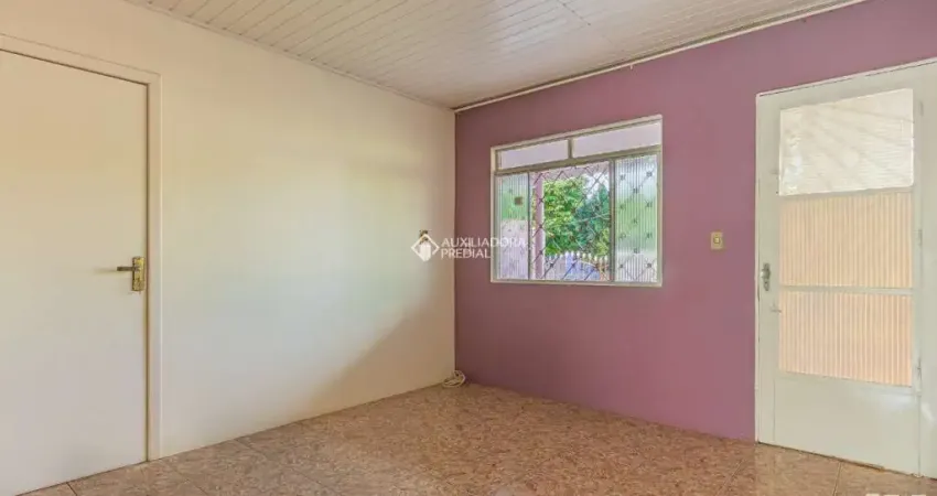 Casa com 3 quartos à venda na SESSENTA E CINCO, 23, Guajuviras, Canoas
