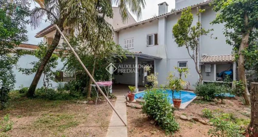 Casa em condomínio fechado com 3 quartos à venda na Rua das Bromélias, 247, Estância Velha, Canoas