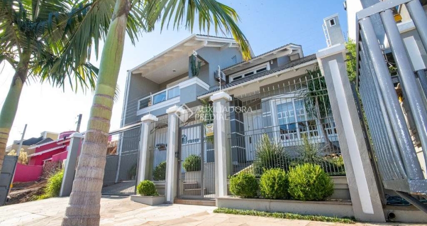Casa com 3 quartos à venda na Rua Dinamarca, 268, Marechal Rondon, Canoas
