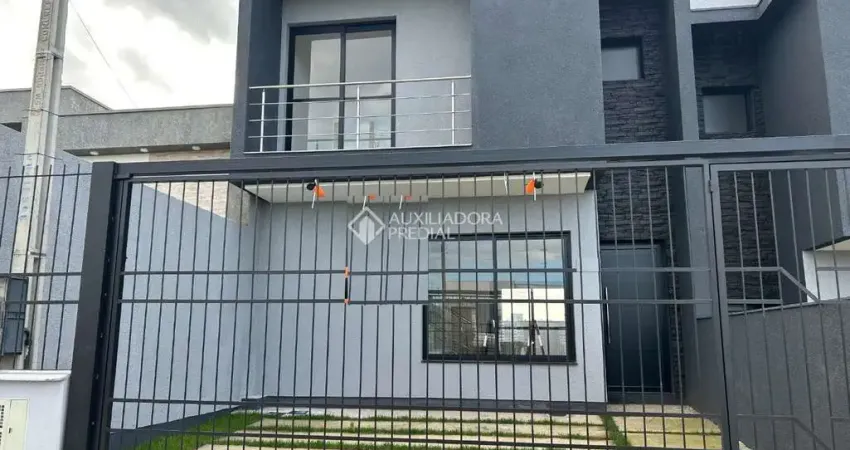 Casa com 3 quartos à venda na Rubem Fonseca Vargas, 116, Dom Feliciano, Gravataí