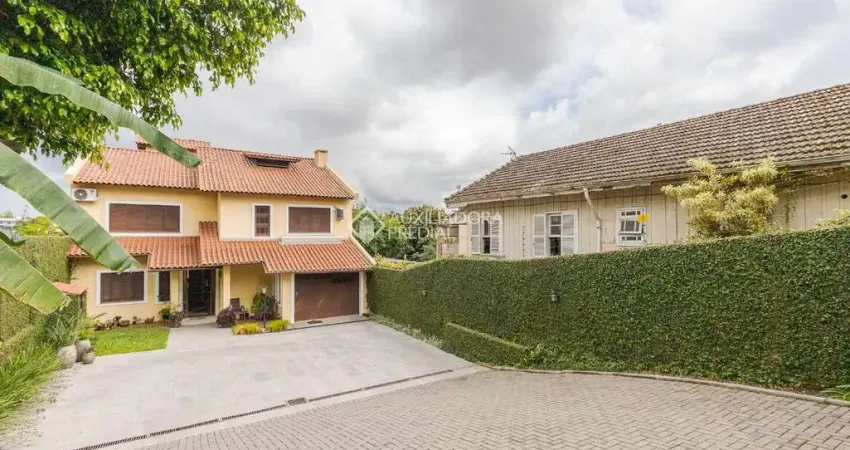 Casa com 3 quartos à venda na Rua Clemente Pinto, 103, Nossa Senhora das Graças, Canoas