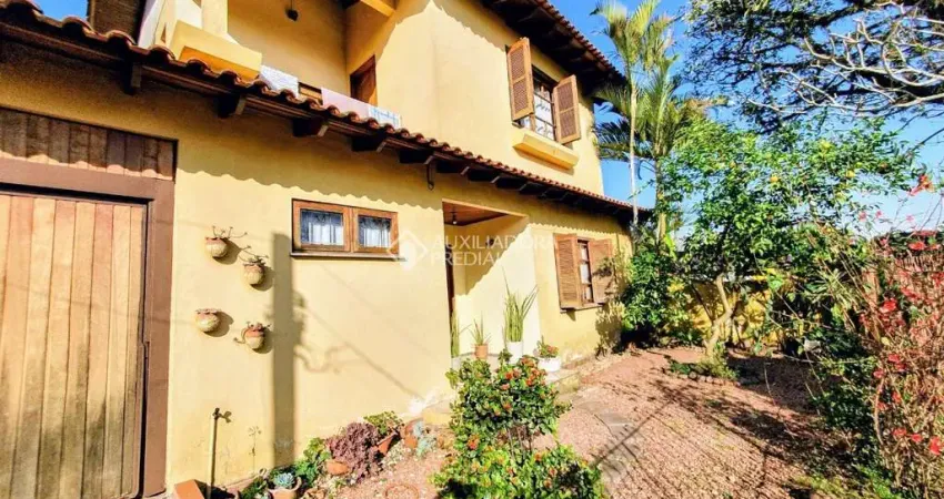 Casa em condomínio fechado com 5 quartos à venda na Rua Osvaldo Optiz, 533, Estância Velha, Canoas