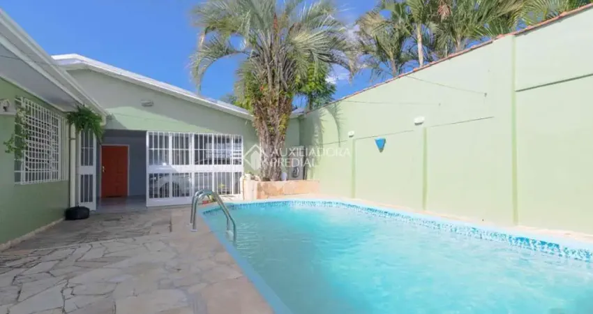 Casa com 3 quartos à venda na Rua Pistoia, 864, Rio Branco, Canoas