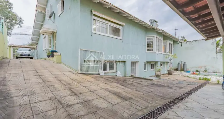 Casa com 5 quartos à venda na Rua Pero Vaz de Caminha, 571, Nossa Senhora das Graças, Canoas