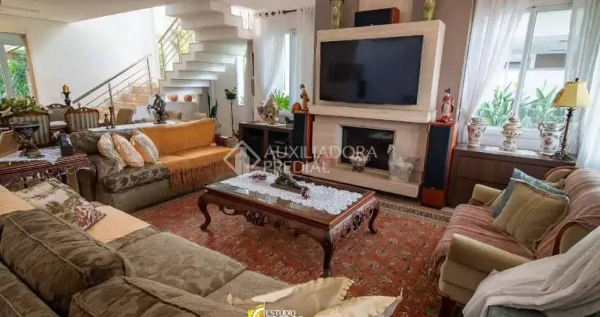 Casa em condomínio fechado com 3 quartos à venda na Avenida Açucena, 50, Estância Velha, Canoas