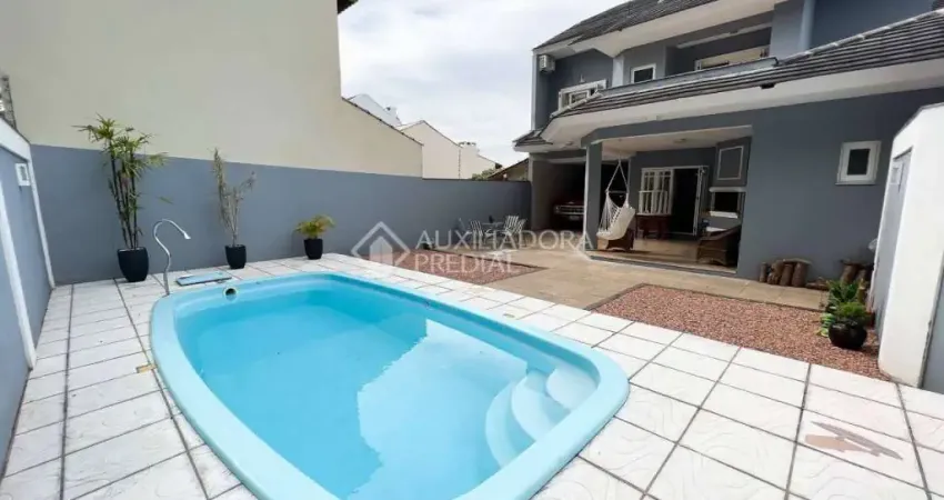 Casa com 4 quartos à venda na Rua San Marino, 628, Marechal Rondon, Canoas