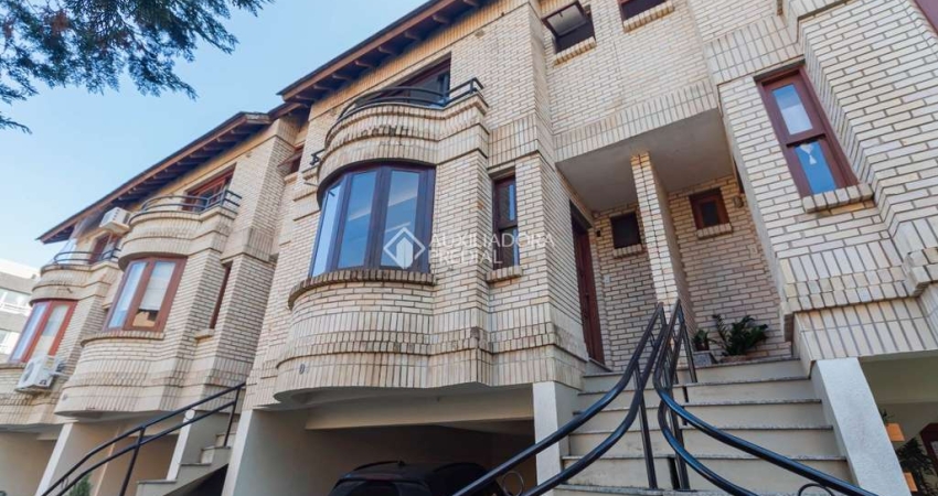 Casa em condomínio fechado com 3 quartos à venda na Rua Curupaiti, 260, Cristal, Porto Alegre
