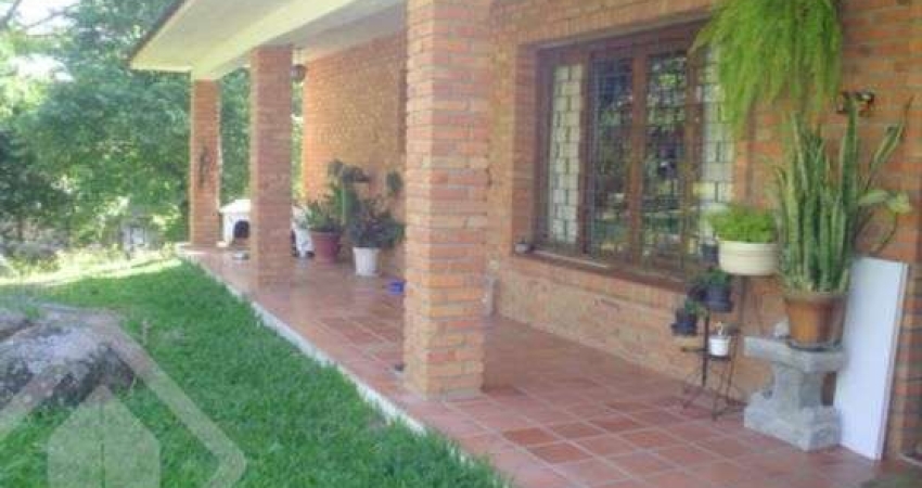 Casa em condomínio fechado com 3 quartos à venda na Estrada Kanazawa, 84, Vila Nova, Porto Alegre